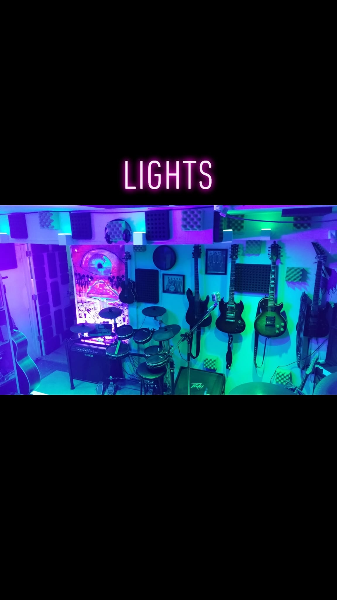 Lit-up DJ mixer with colorful studio lights